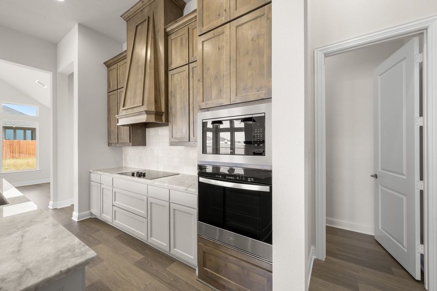 Furnished interior view inside a new home in Bull Hide Estates, Hewitt (Image 9).