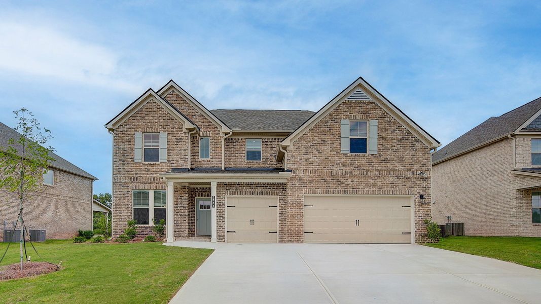 Representative exterior photo of a completed home built from the Isabella II by DRB Homes in Adagio, Dacula, GA (Image 24).
