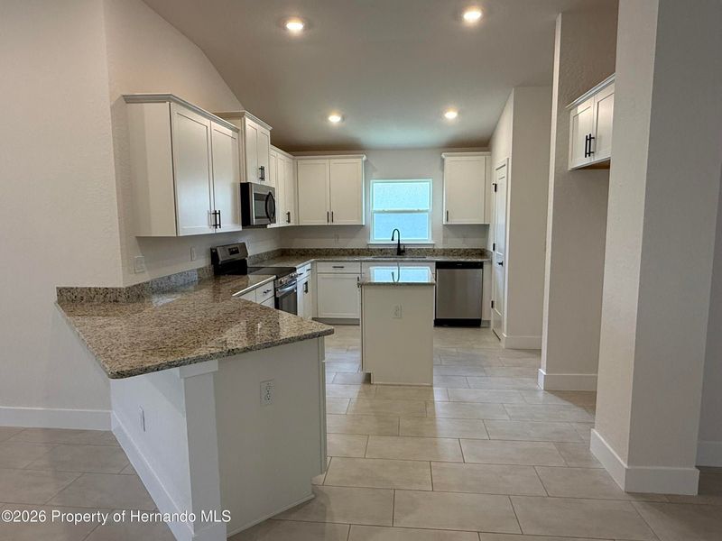 Furnished interior view inside a new home in Winding Oaks, Weeki Wachee (Image 3).
