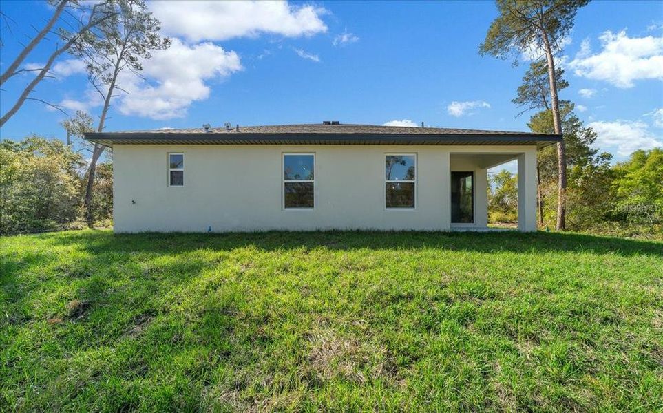 Exterior details and patio area of a home in , Spring Hill (Image 35). Exterior details and patio area of a home in , Spring Hill (Image 35).