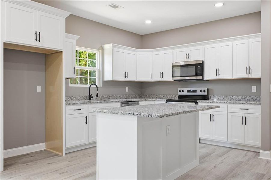 Furnished interior view inside a new home in , Calhoun (Image 14).