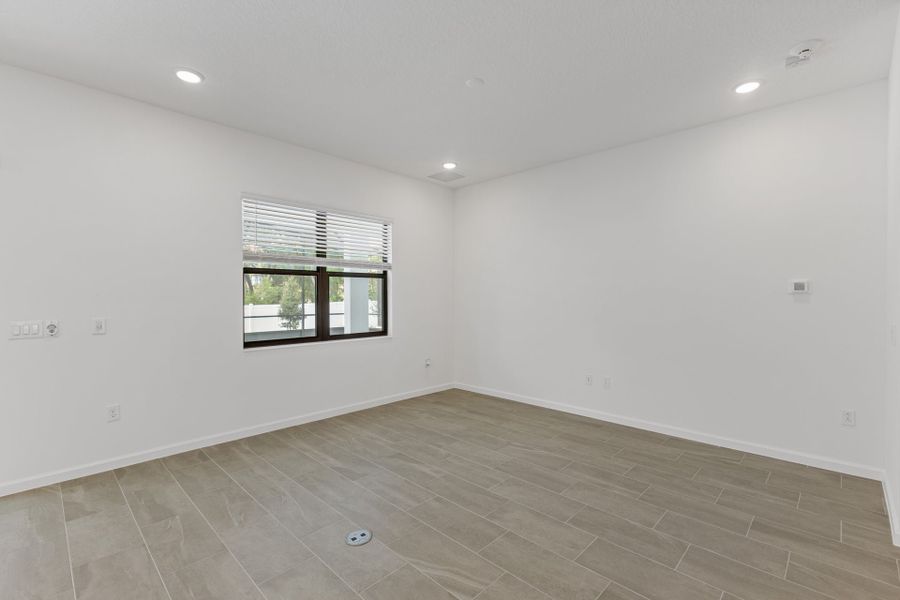 Representative unfurnished interior of a home built from the Aquamarine by Park Square Residential in Paradiso Grande, Orlando (Image 10).
