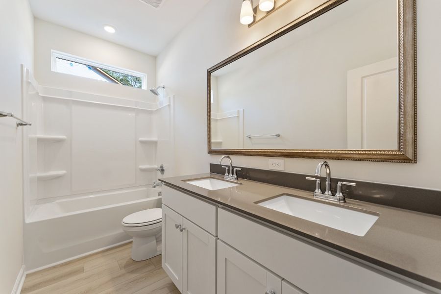 Furnished interior view inside a new home in Landing at Pine Lake, Anderson (Image 12).