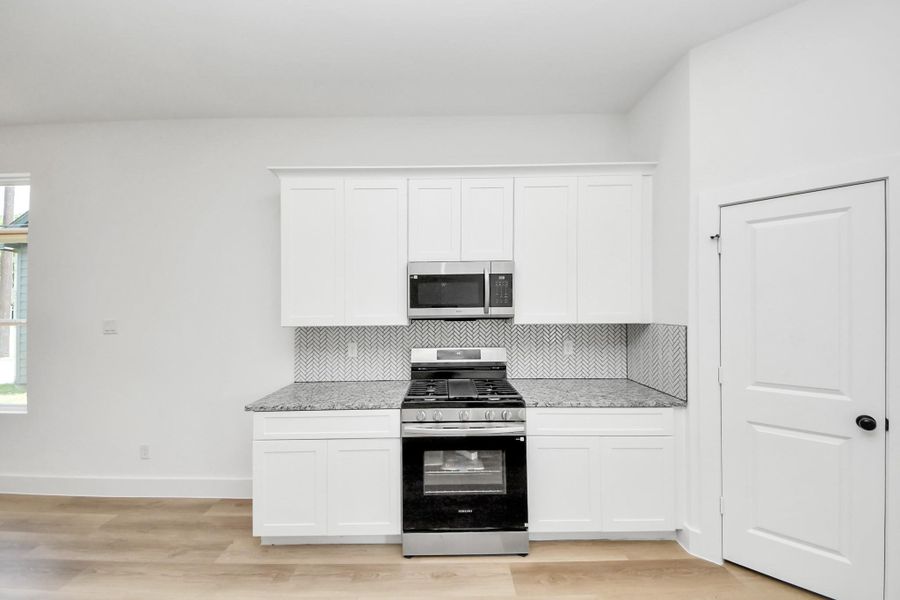Furnished interior view inside a new home in , Huffman (Image 10).