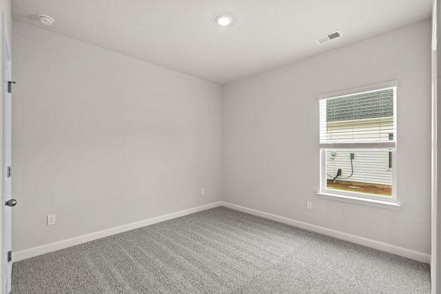 Spacious, unfurnished interior of a new home in Cypress Ridge - The Coastline Series, Longs (Image 28).