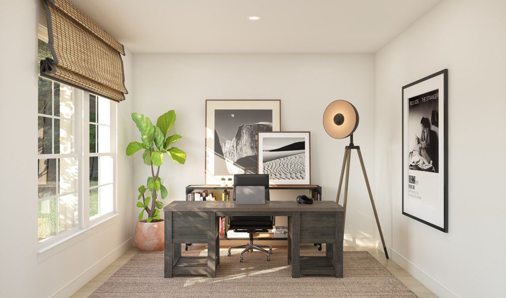 Private home office with double barn doors off the foyer