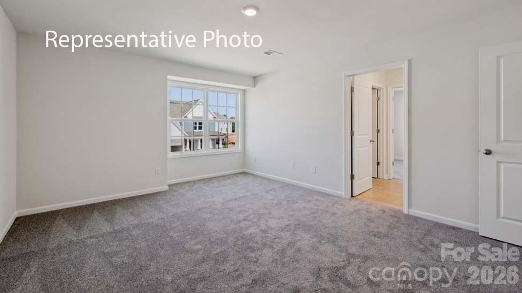Spacious, unfurnished interior of a new home in Sanctuary at Southgate, Indian Trail (Image 41).