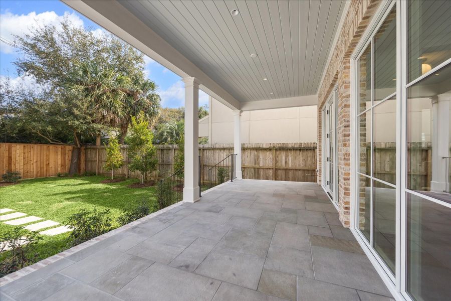 Back covered patio area for relaxing or entertiaining. Back covered patio area for relaxing or entertiaining.