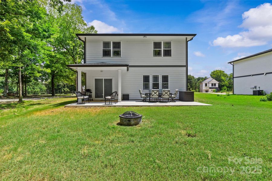 Front exterior of a new home in , Charlotte, NC, highlighting curb appeal (Image 1).