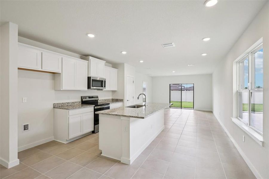 Furnished interior view inside a new home in Grasslands West, Lakeland (Image 6).