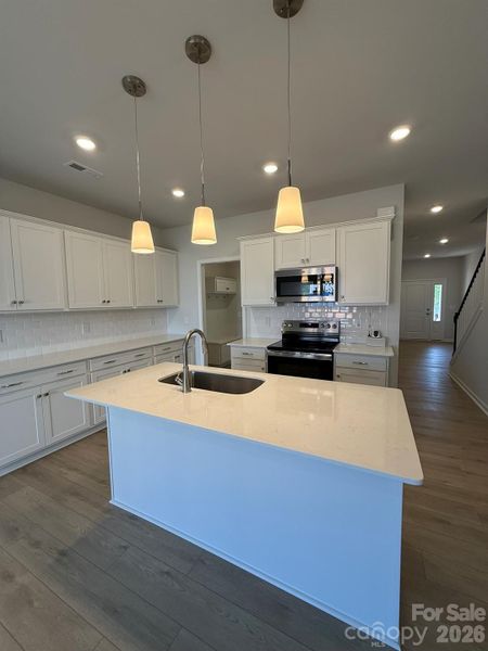 Furnished interior view inside a new home in Nichols Landing, Charlotte (Image 3).