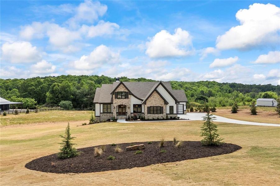 Front exterior of a new home in , Monroe, GA, highlighting curb appeal (Image 28).
