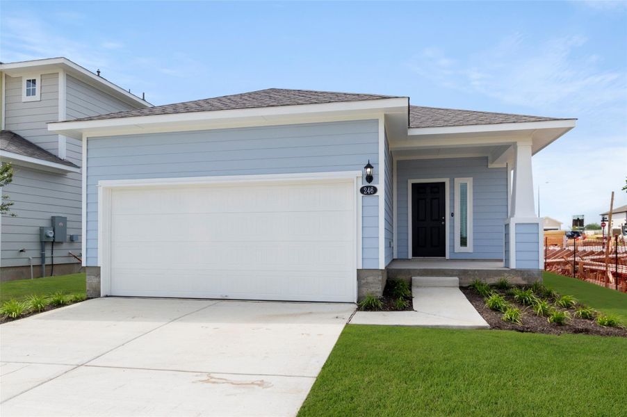 Front exterior of a new home in Harvest Ridge, Elgin, TX, highlighting curb appeal (Image 21).