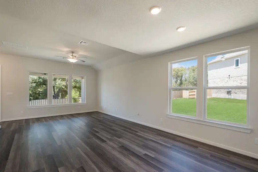 Representative unfurnished interior of a home built from the Pleasanton by Scott Felder Homes in Flora, Hutto (Image 7).
