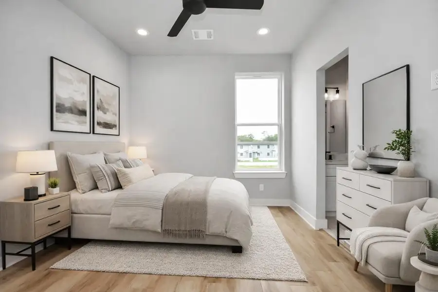 Cozy guest bedroom with modern finishes and soft natural light. Thoughtfully designed for comfort and everyday functionality.