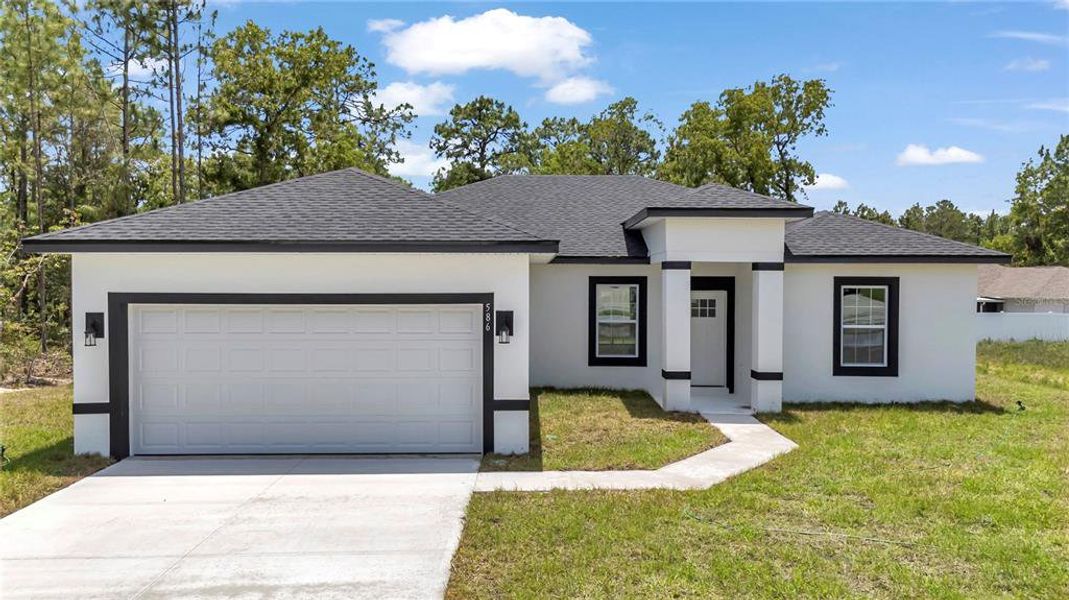 Front exterior of a new home in , Ocala, FL, highlighting curb appeal (Image 15).
