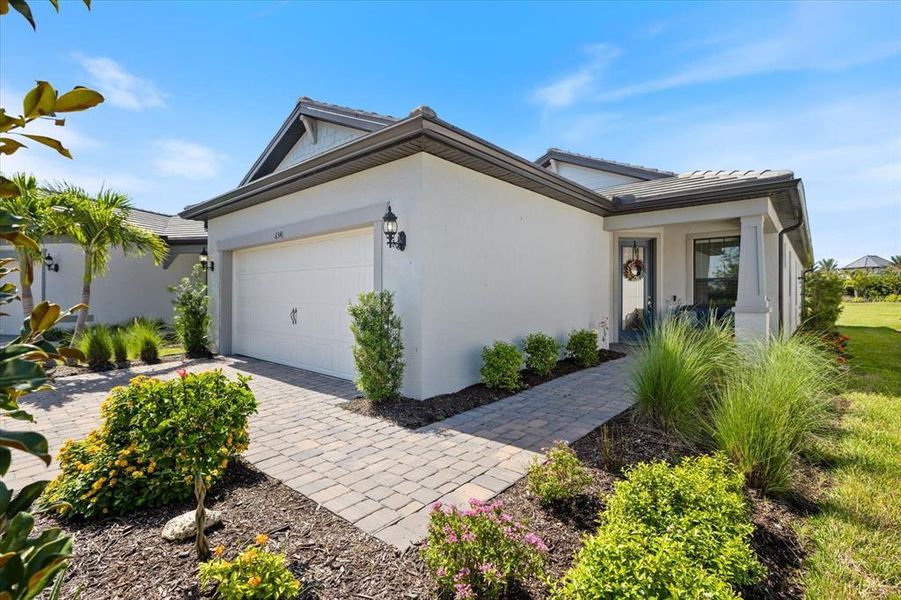 Front exterior of a new home in , Nokomis, FL, highlighting curb appeal (Image 2).
