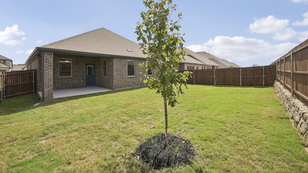 Exterior details and patio area of a home in Silverado, Aubrey (Image 3).