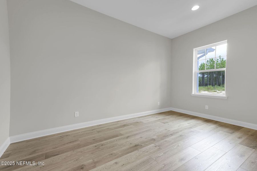 Spacious, unfurnished interior of a new home in Hidden Creek at SilverLeaf, St. Augustine (Image 24).