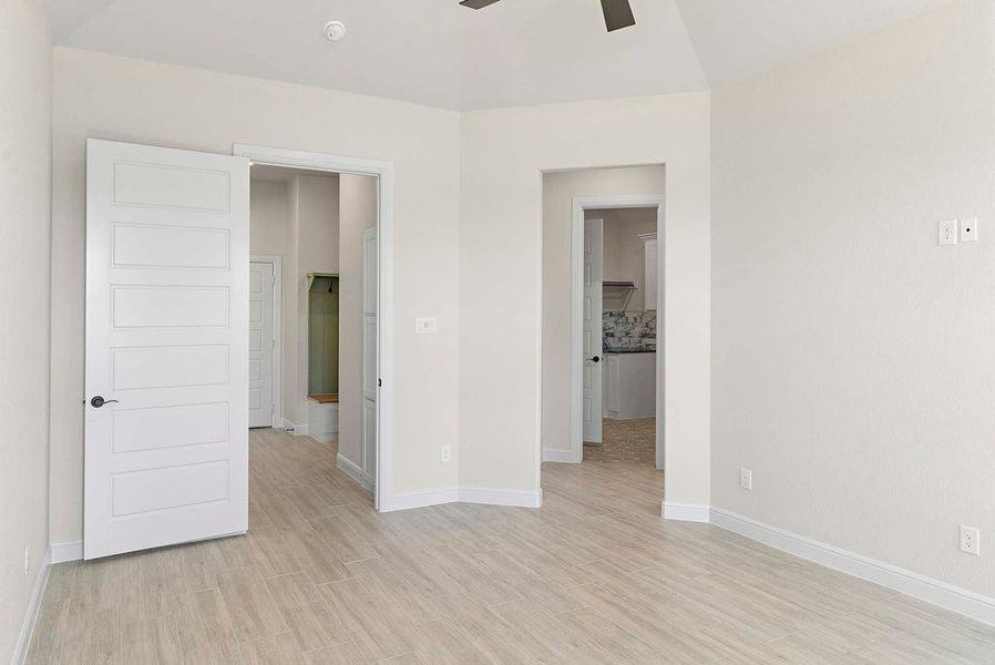 Unfurnished bedroom with light wood-style flooring and a ceiling fan
