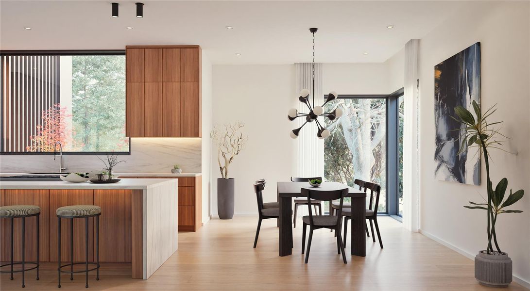 Dining room featuring a chandelier, light wood-style flooring, plenty of natural light, and recessed lighting