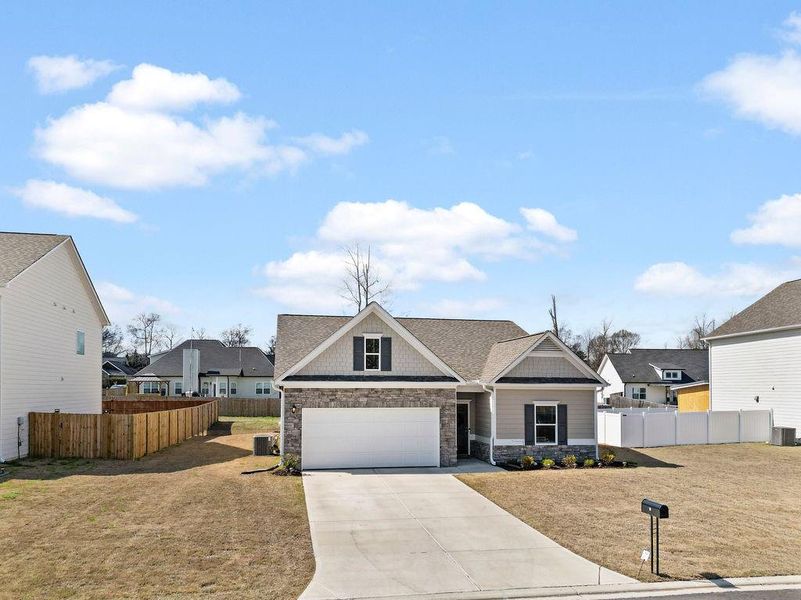 Front exterior of a new home in , Rome, GA, highlighting curb appeal (Image 22).
