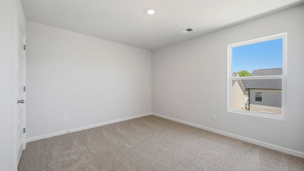 Spacious, unfurnished interior of a new home in Shoal Creek, Hampton (Image 20).