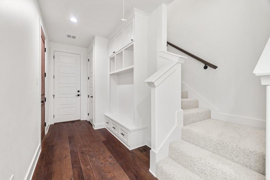 Mudroom off garage with stairs to Flex room/guest suite upstairs Mudroom off garage with stairs to Flex room/guest suite upstairs