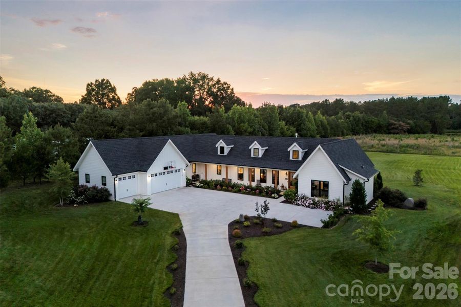 Front exterior of a new home in , Rock Hill, SC, highlighting curb appeal (Image 26).