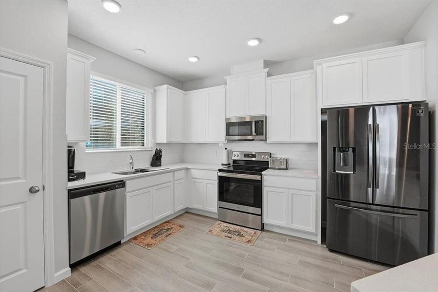 Furnished interior view inside a new home in , Orlando (Image 11). Furnished interior view inside a new home in , Orlando (Image 11).