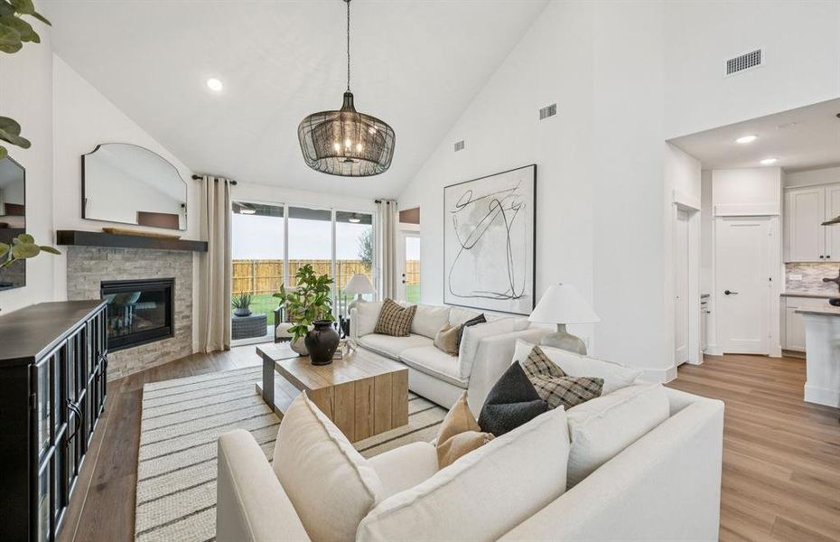 Spacious gathering room featuring optional fireplace *model representation