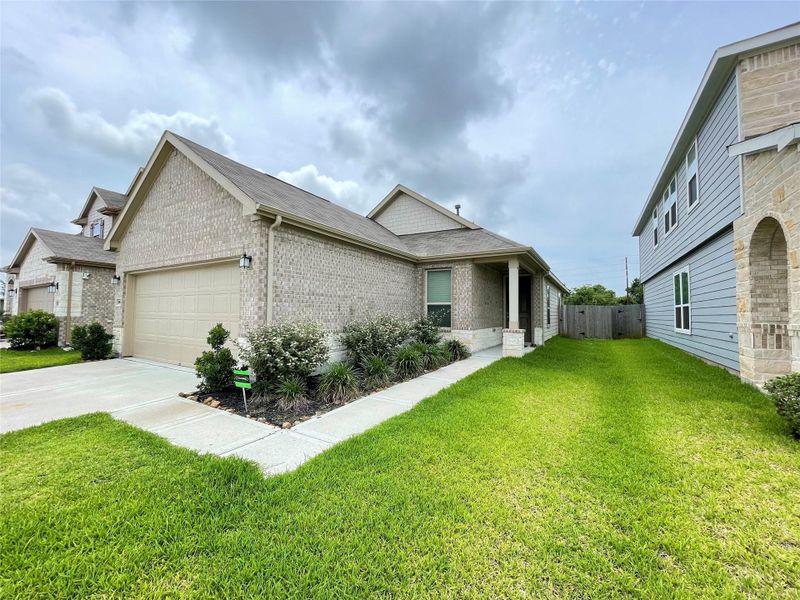 Front exterior of a new home in Olympia Falls, Fresno, TX, highlighting curb appeal (Image 2). Front exterior of a new home in Olympia Falls, Fresno, TX, highlighting curb appeal (Image 2).