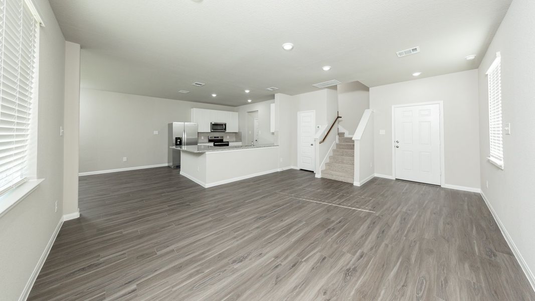Family Room to Kitchen and Dining Area