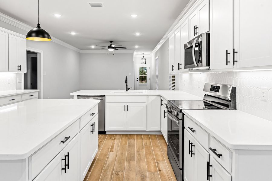 Furnished interior view inside a new home in Crescent and Symphony at Hammock Bay, Freeport (Image 6). Furnished interior view inside a new home in Crescent and Symphony at Hammock Bay, Freeport (Image 6).