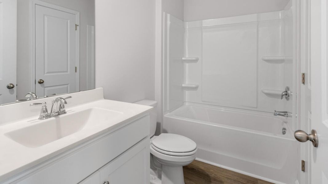 Furnished interior view inside a new home in Grayson Park Townhomes, Leland (Image 9).