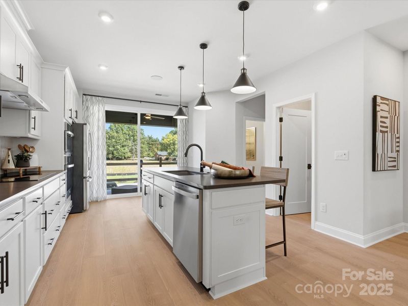 Functional Kitchen Layout Holding Charm and Sophistication. *Model Photos | Actual Finishes, Structural Selections, and Orientation May Vary. Functional Kitchen Layout Holding Charm and Sophistication. *Model Photos | Actual Finishes, Structural Selections, and Orientation May Vary.