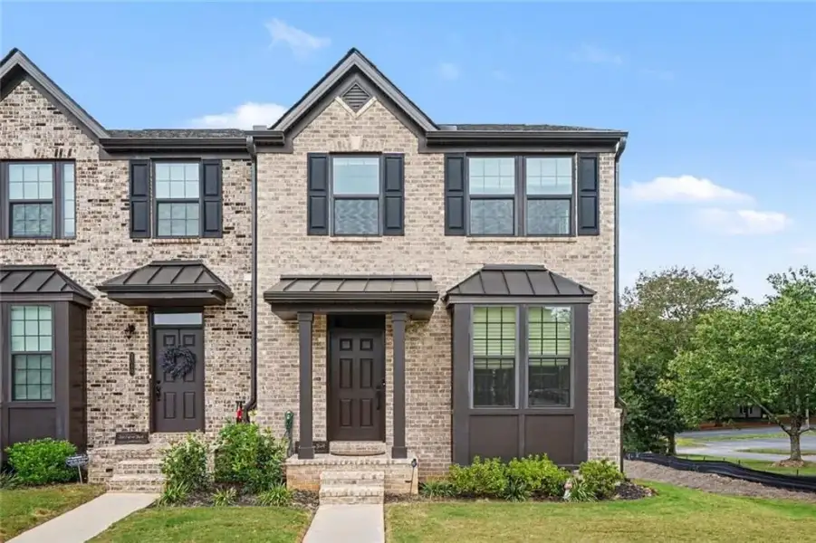 Front exterior of a new home in , Lawrenceville, GA, highlighting curb appeal (Image 27).