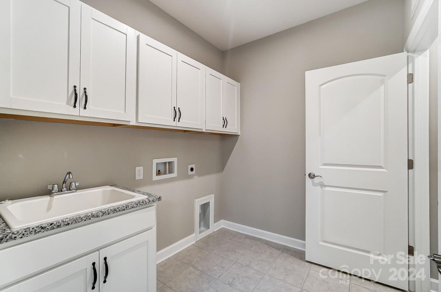 Laundry Room with Sink and Cabinets-Picture Similar to Subject Property