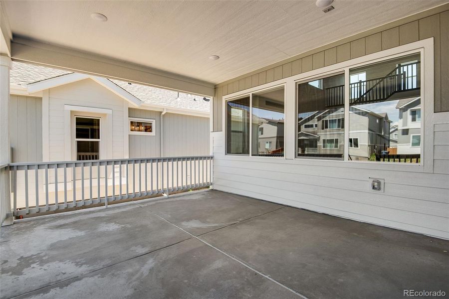 Front exterior of a new home in Reunion Ridge, Commerce City, CO, highlighting curb appeal (Image 26).