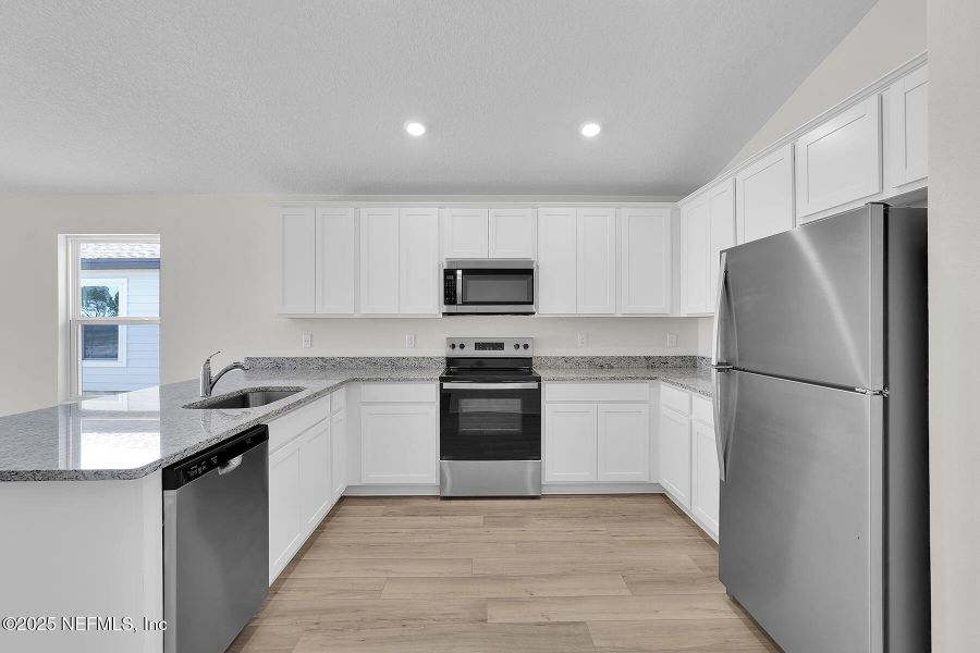 Furnished interior view inside a new home in , Jacksonville (Image 8).