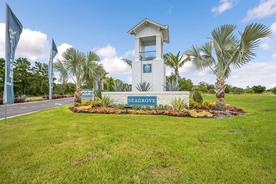 Front exterior of a new home in Seagrove: The Indies, Fort Pierce, FL, highlighting curb appeal (Image 1). Front exterior of a new home in Seagrove: The Indies, Fort Pierce, FL, highlighting curb appeal (Image 1).