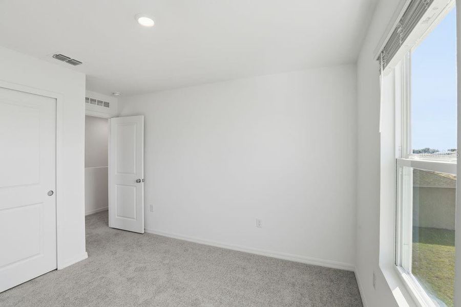 Spacious, unfurnished interior of a new home in Waterstone, Groveland (Image 46). Spacious, unfurnished interior of a new home in Waterstone, Groveland (Image 46).