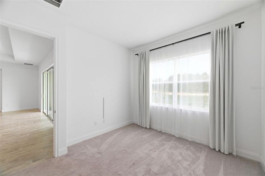 Spacious, unfurnished interior of a new home in Tamarack at Two Rivers, Zephyrhills (Image 58).