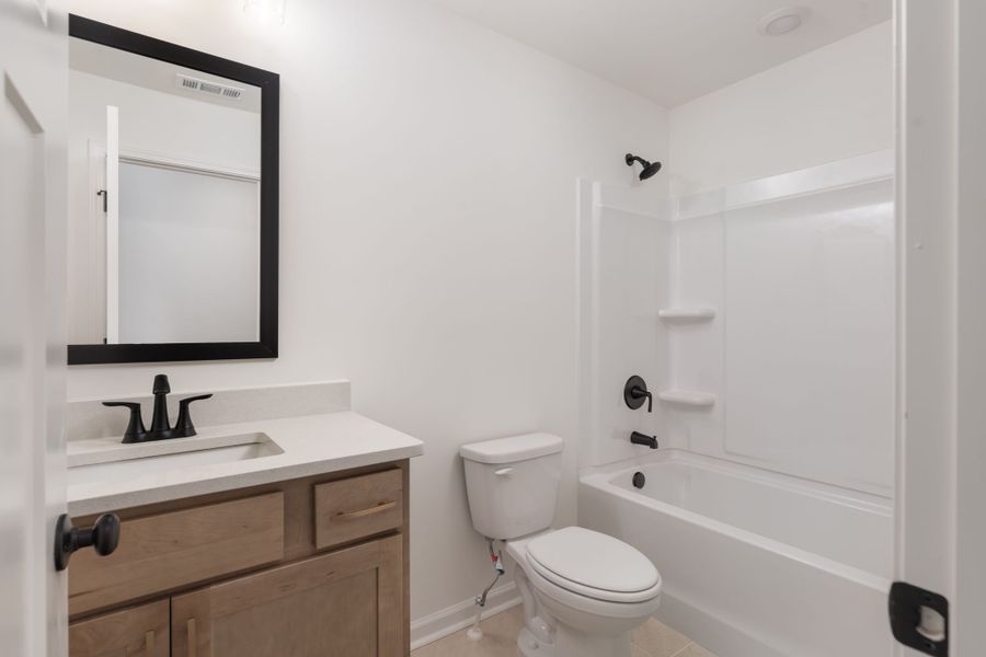 Furnished interior view inside a new home in Stewart Estates, Meansville (Image 17).