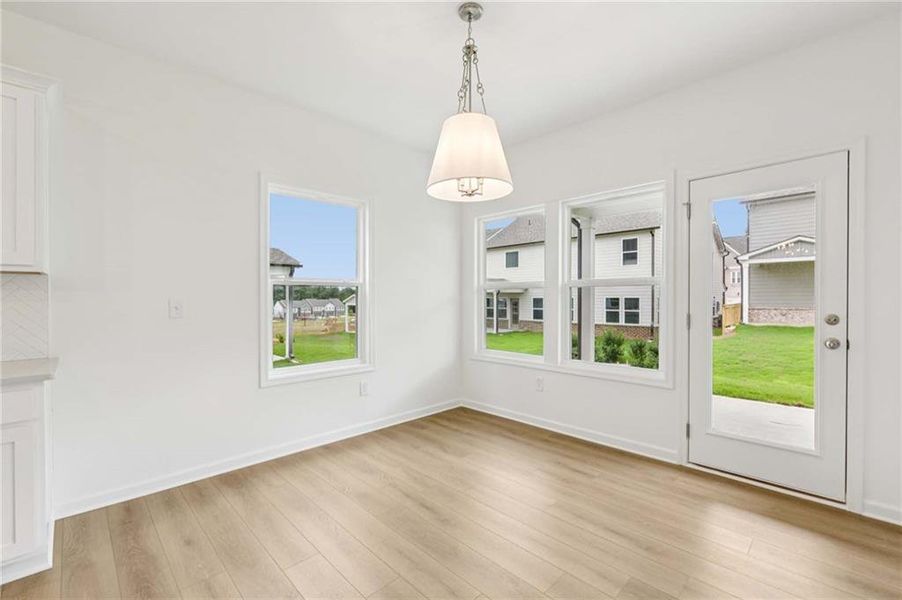 Spacious, unfurnished interior of a new home in Eastlyn Crossing - Single Family, Flowery Branch (Image 16). Spacious, unfurnished interior of a new home in Eastlyn Crossing - Single Family, Flowery Branch (Image 16).