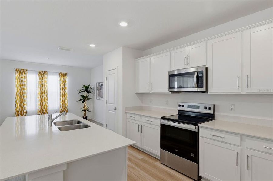 Furnished interior view inside a new home in Oakfield Lakes, Parrish (Image 19).