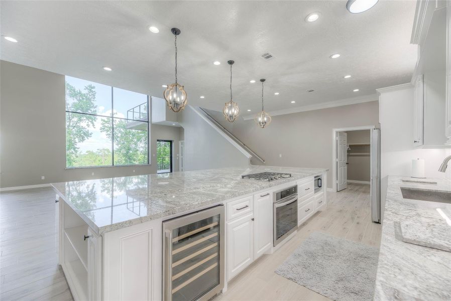 Huge kitchen that looks into the living room with an amazing view of the pond from the 16x12 window (Building B) Huge kitchen that looks into the living room with an amazing view of the pond from the 16x12 window (Building B)