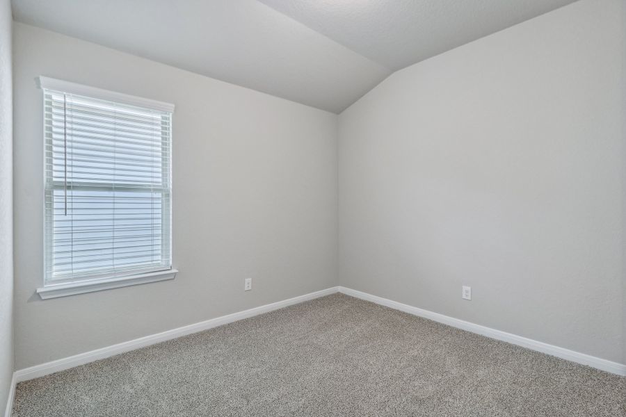 Guest bedroom in the Allen floorplan at a Meritage Homes community. Guest bedroom in the Allen floorplan at a Meritage Homes community.