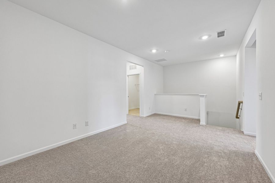 Spacious, unfurnished interior of a new home in Terraces at the Exchange, Fort Mill (Image 18).