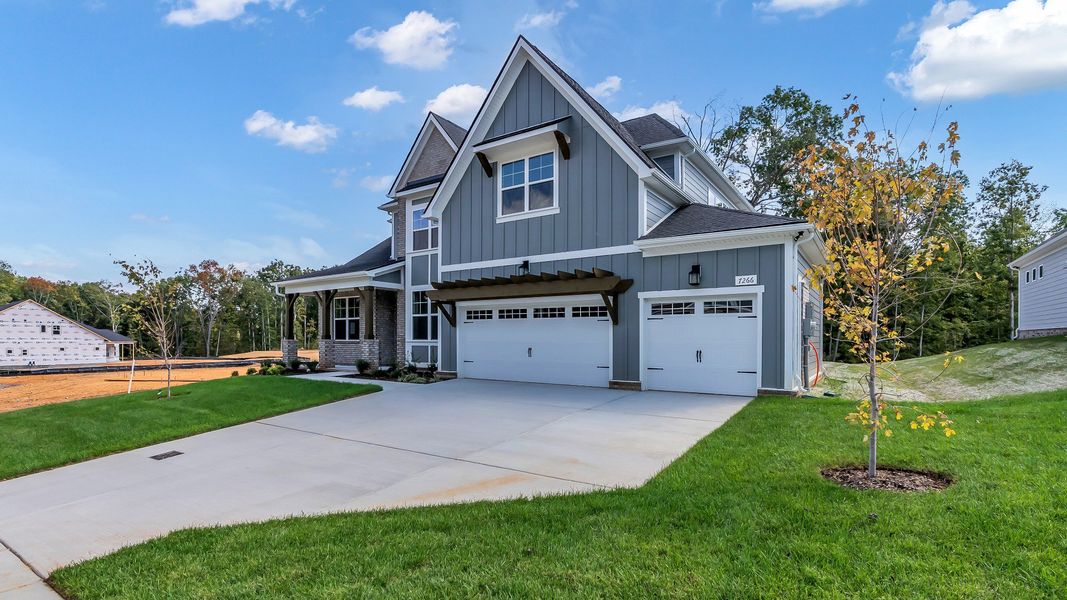 Front exterior of a new home in Brush Creek, Fairview, TN, highlighting curb appeal (Image 2).